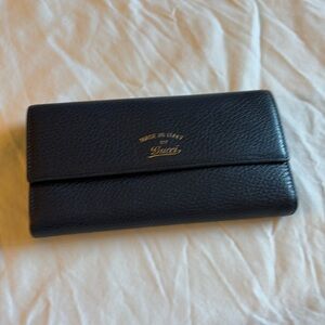 Gucci wallet.